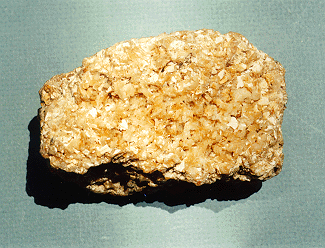 Name this rock/mineral. If its a rock, what class?