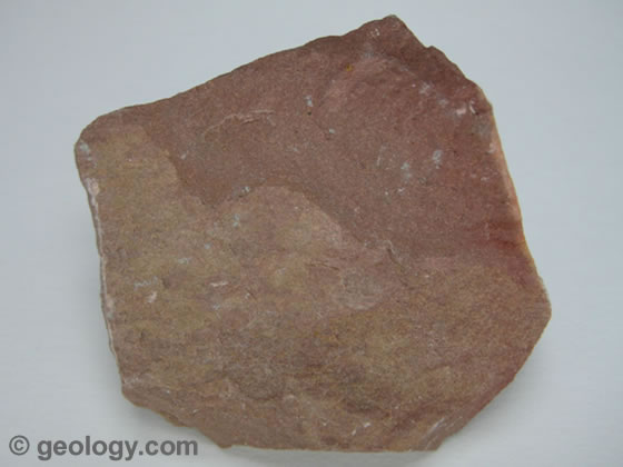 Name this rock/mineral. If its a rock, what class?