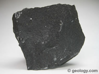 Name this rock/mineral. If its a rock, what class?